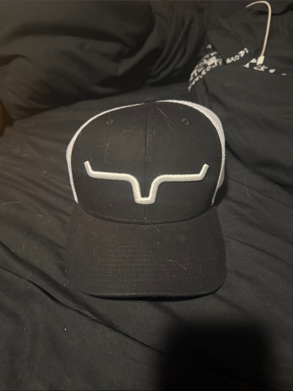 Kimes Ranch Black Trucker Hat with Silver Logo